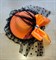 Шляпка заколка с оборками и бантиком, оранжевая с черной оборкой - фото 10166